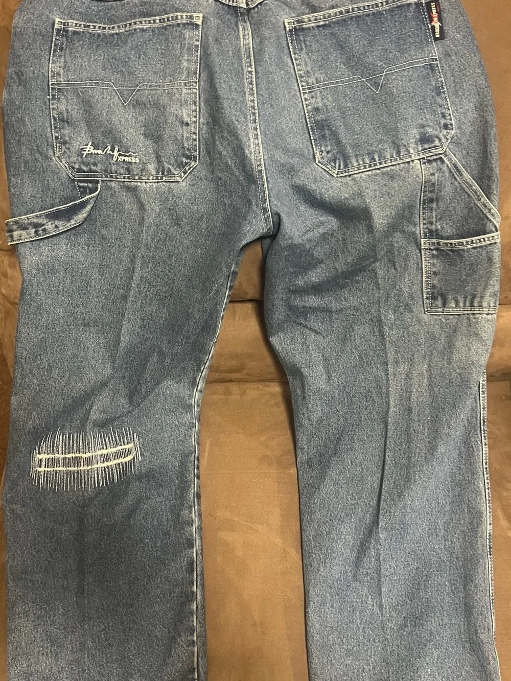 Men's Distressed Blue Jeans with Patch Detail